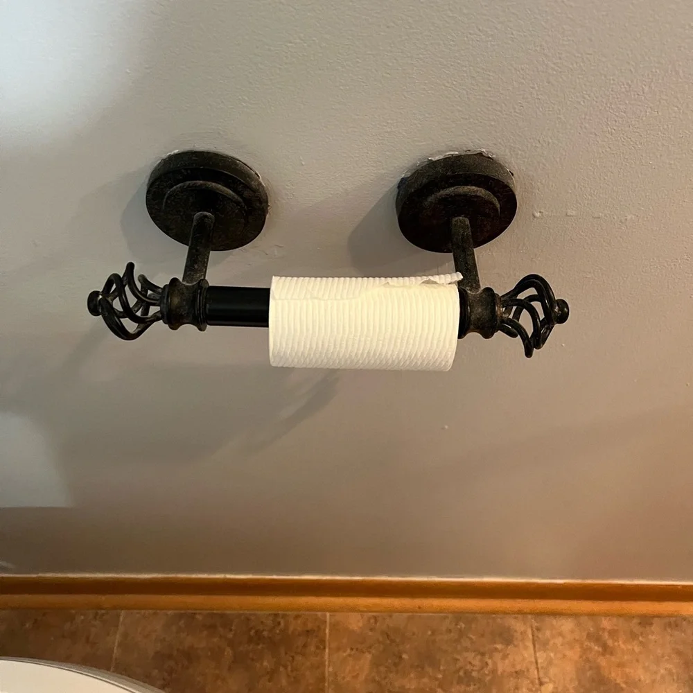Toilet paper and towel rack holders